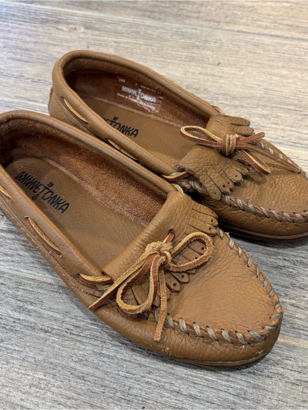 Minnetonka Tan Leather Moccasin Slip-On with Fringe and Bow